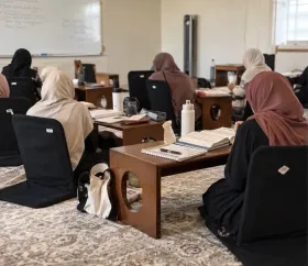 Sabeel students sitting together in class